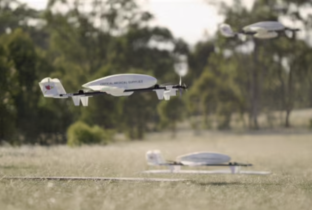 A Swoop Aero drone taking flight and another on the ground