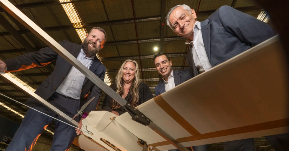 Sypaq’s chief engineer Ross Osborne, and its CEO Amanda Holt, join managing director David Vicino and founder and chairman George Vicino with one of the drones deployed in the Ukraine conflict.